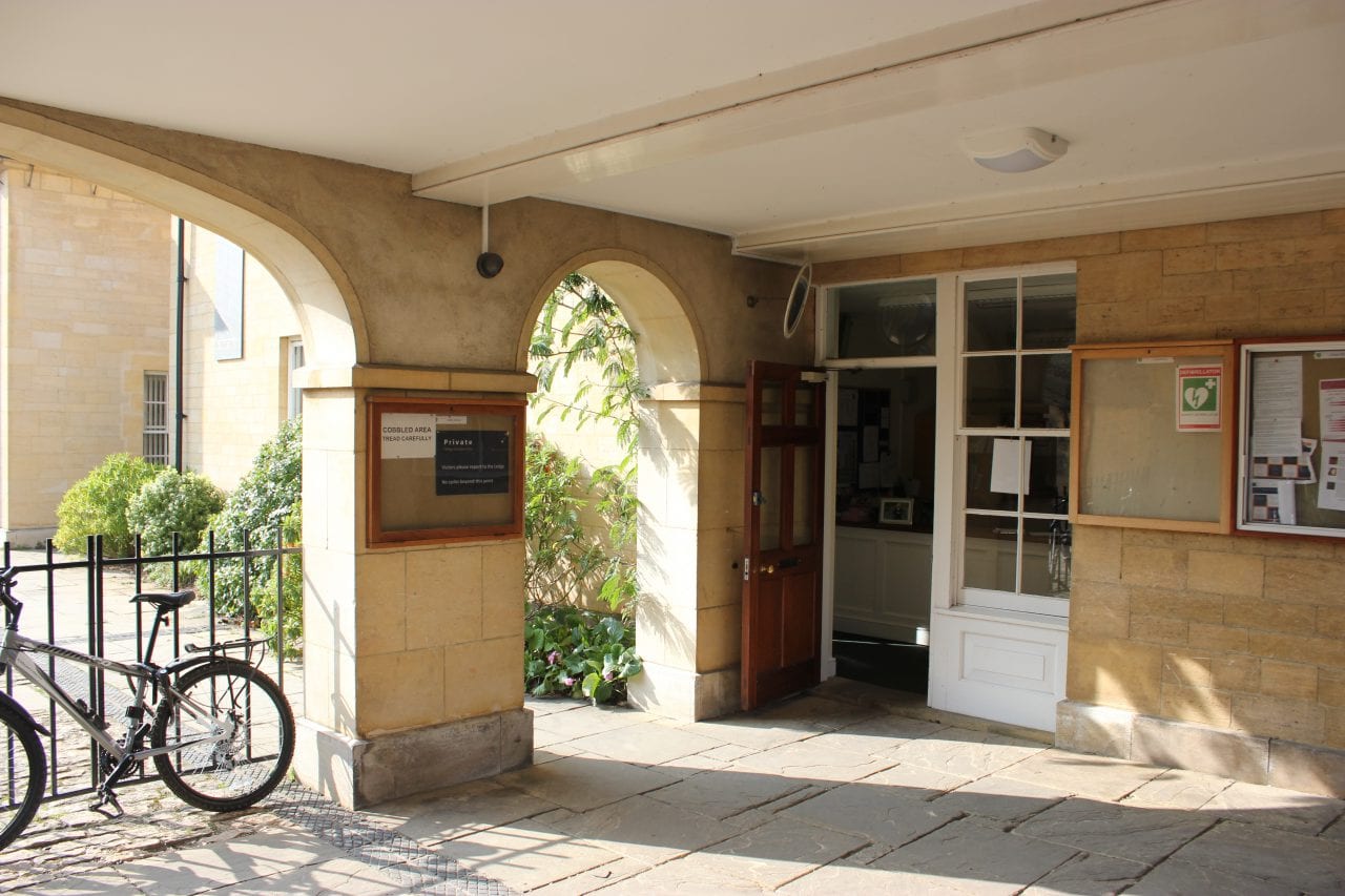 A view of the Lodge entrance at Green Templeton College which is nestled underneath an archway
