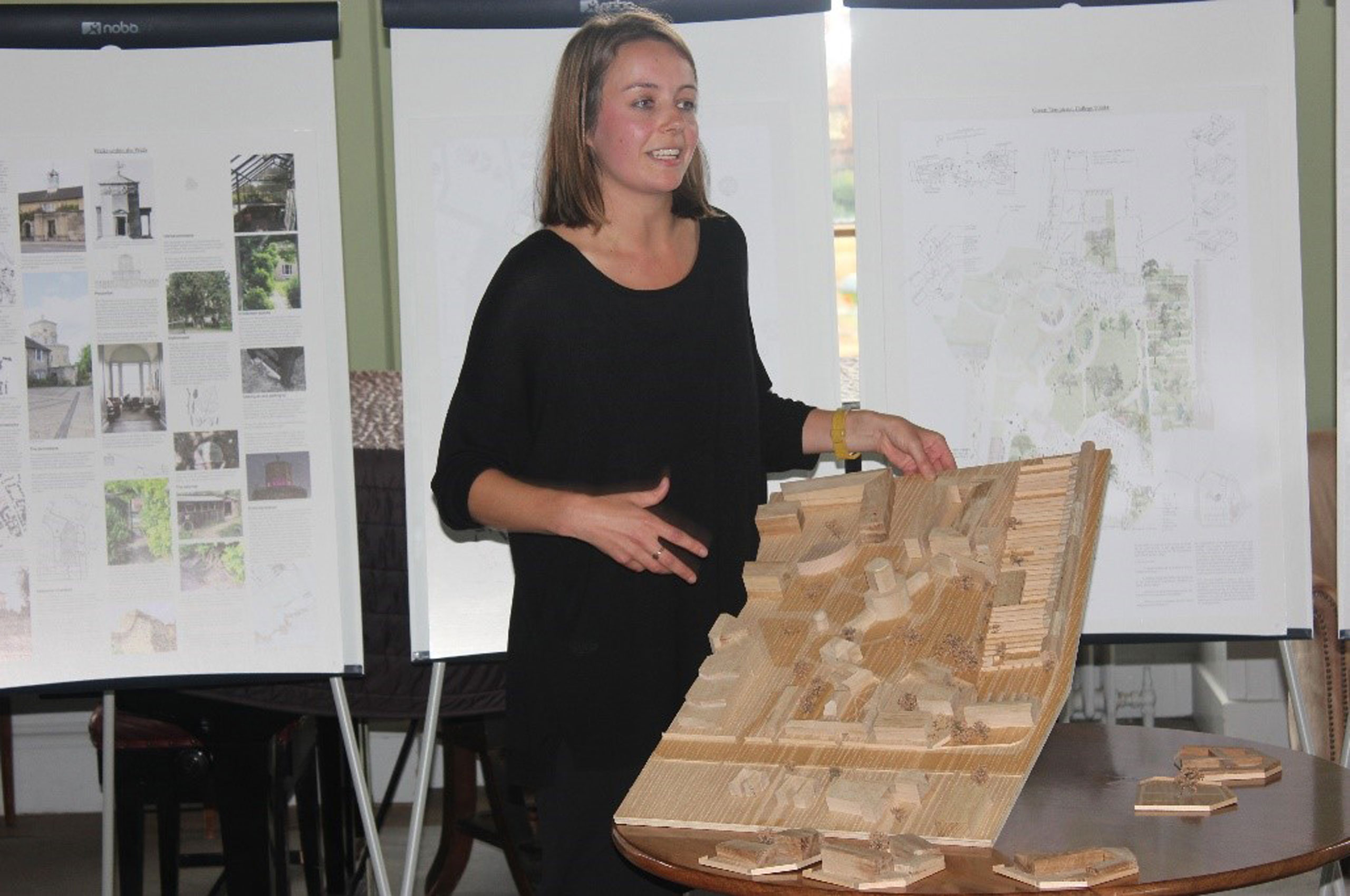 Elli Farrant of architectural firm Feilden Fowles displays a model of Green Templeton College