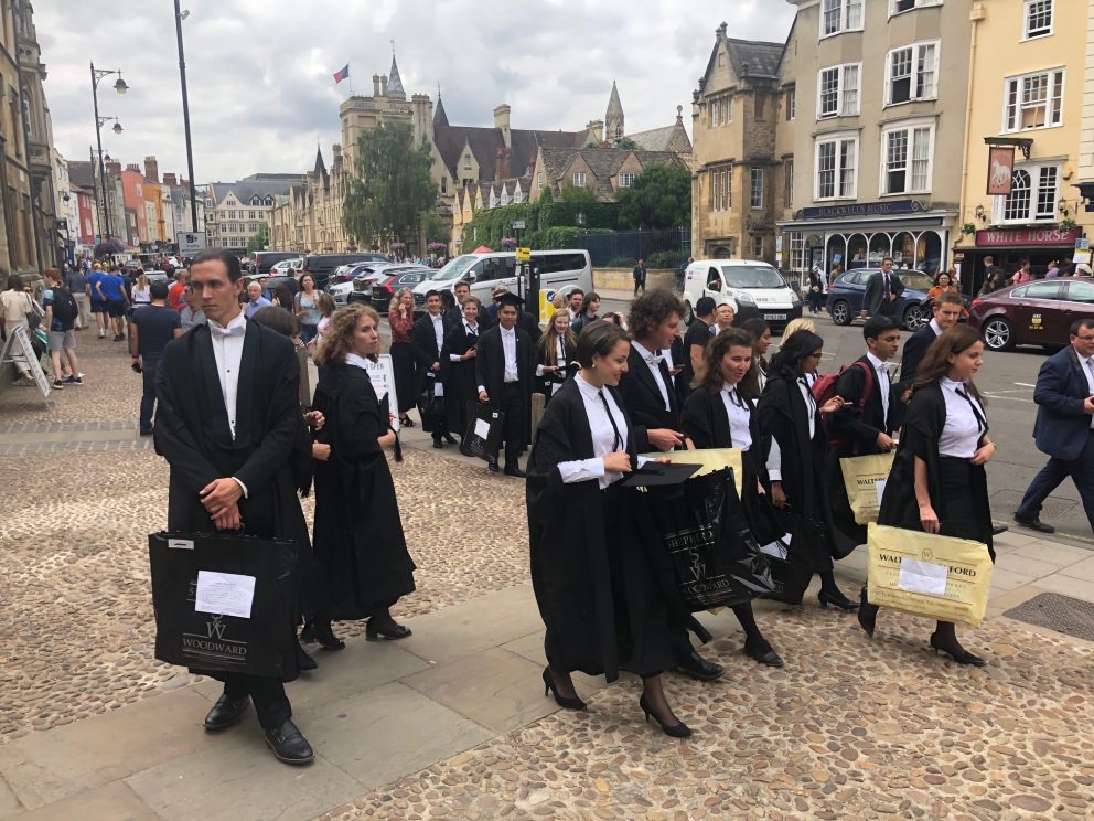 BM students gather outside the Sheldonian ahead of their graduation.