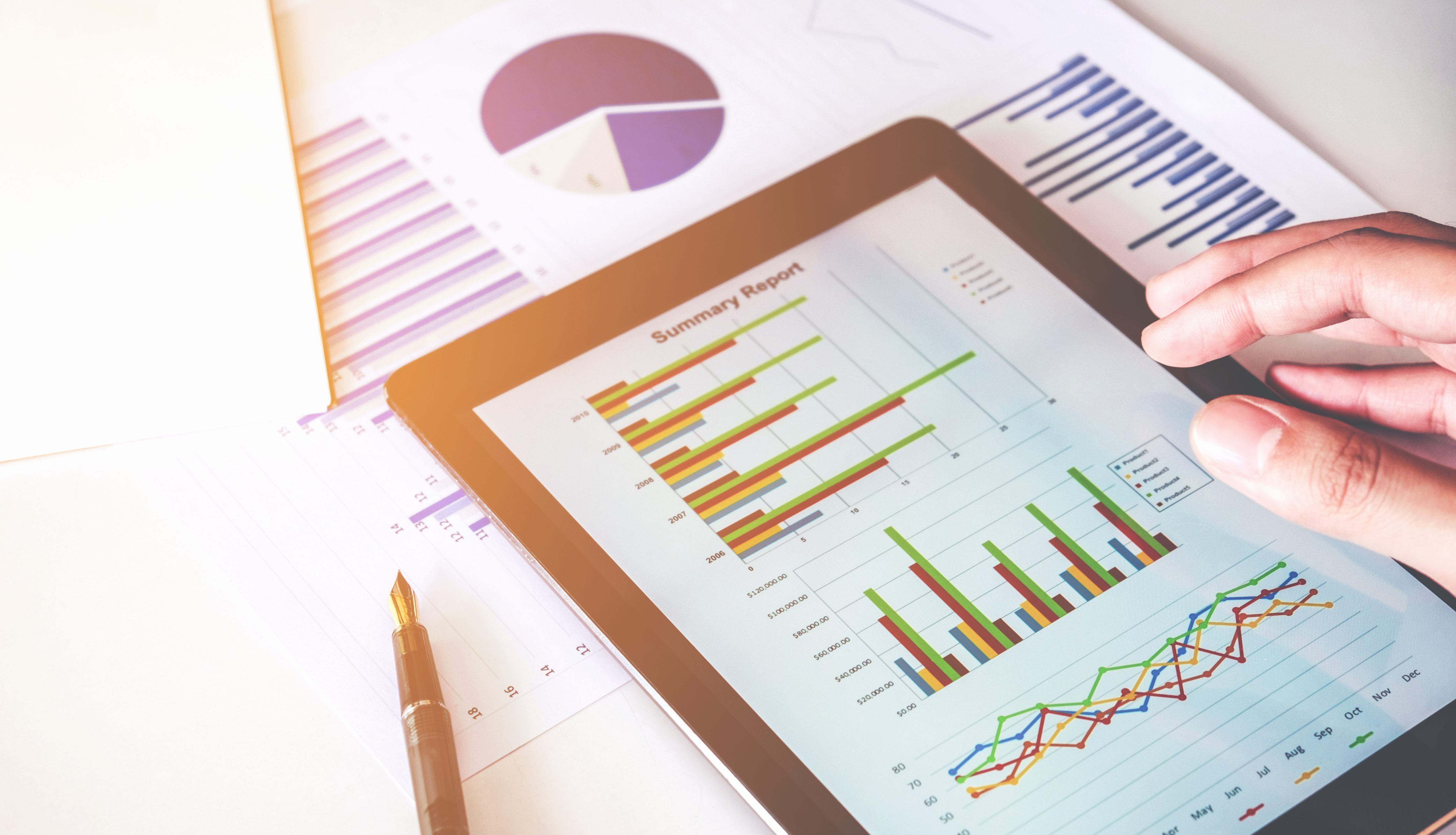 A student views a series of charts and graphs on his iPad for World Statistics Day