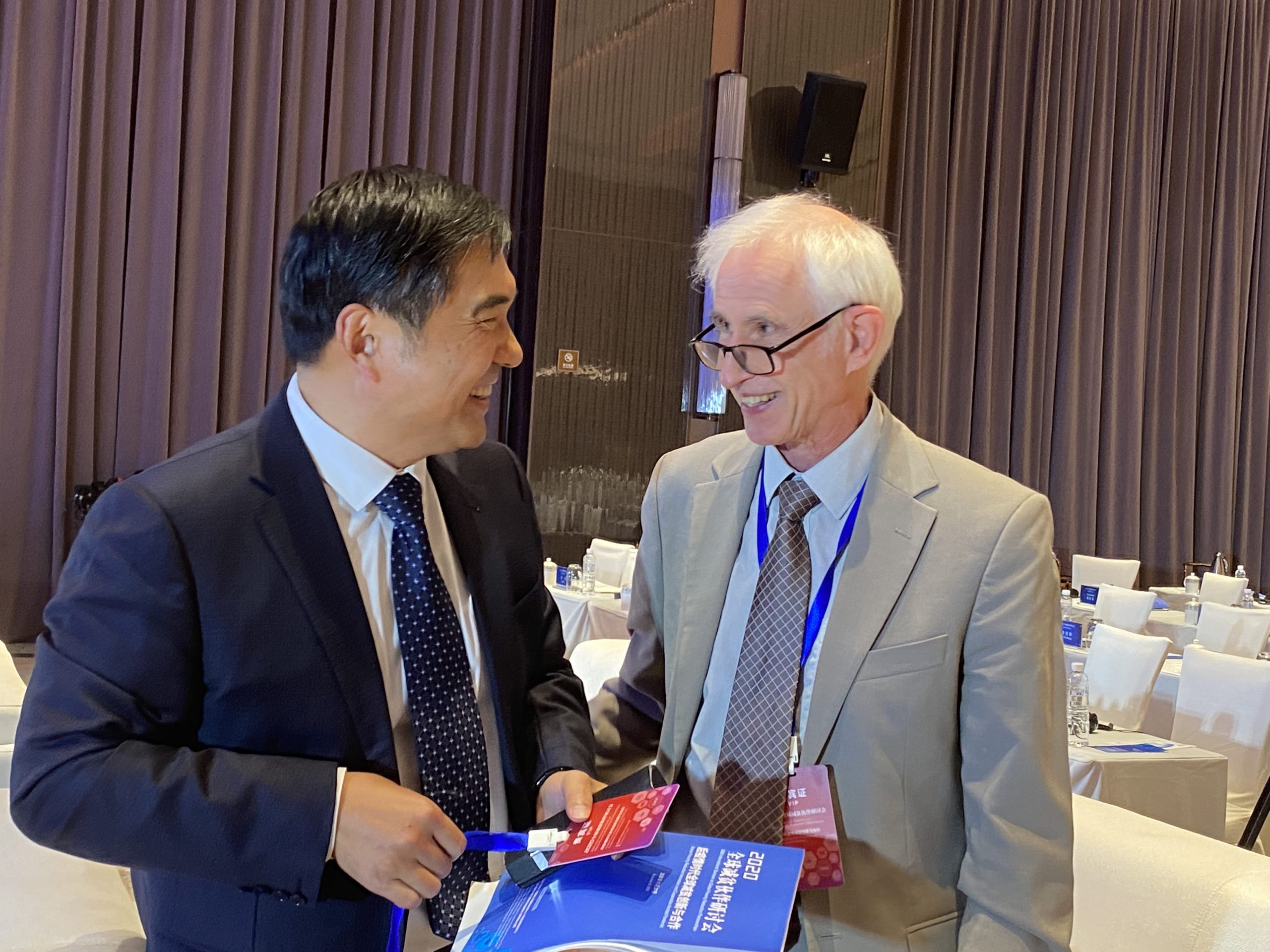 Professor Walker talks to Dr Sun Xuetao at a recent conference