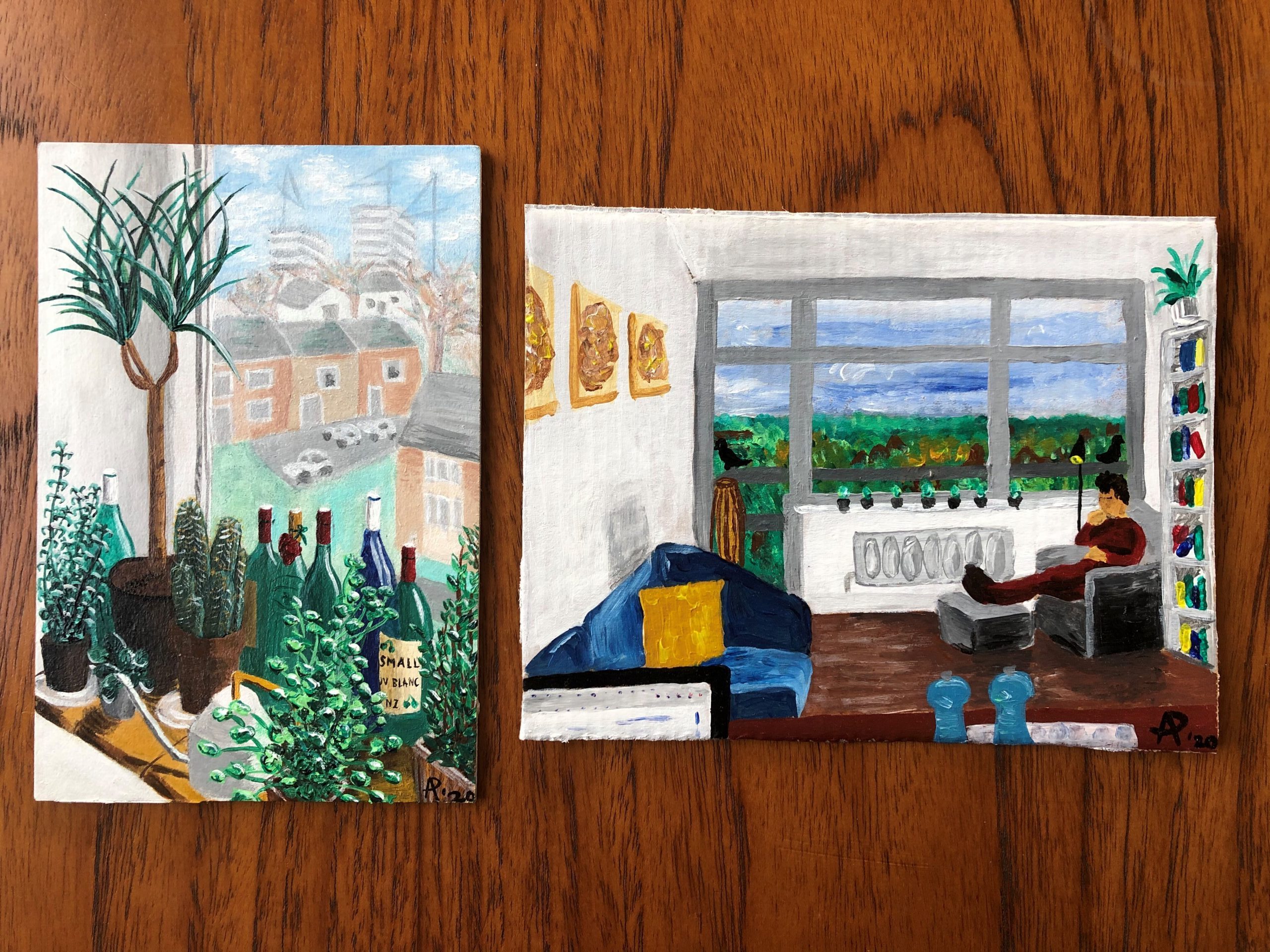 Two paintings, one showing bottles of wine on a windowsill and one of a man reclining in a chair next to a window overlooking a field