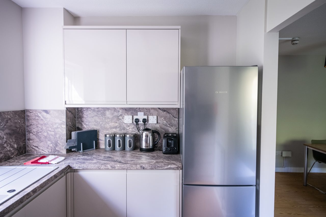 kitchen with big silver fridege-freezer