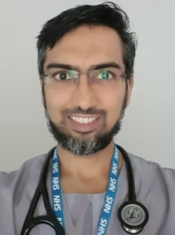 Raghib Ali headshot with NHS lanyard and stethoscope round neck