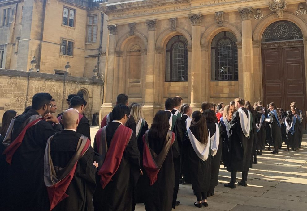 Graduates in gowns ready to enter Sheldonian Theatre