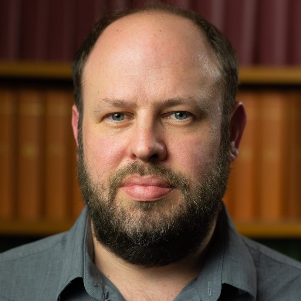 Andrew Sharott Profie Pic In Open Neck Dark Shirt Square