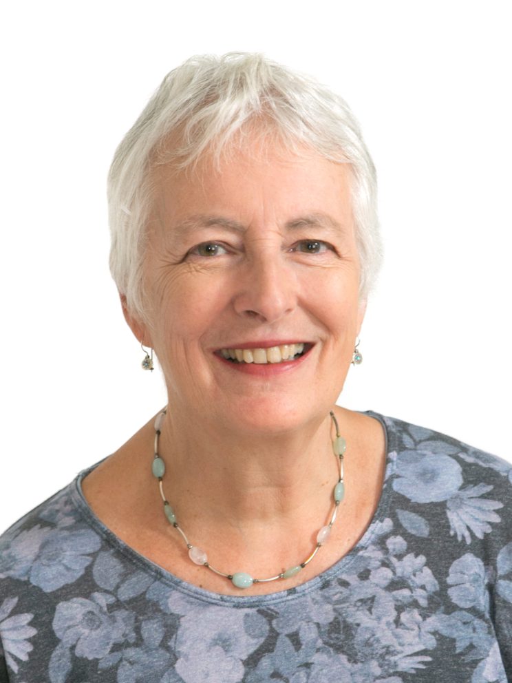 Angela Coulter Profile Pic Smiling On White Background