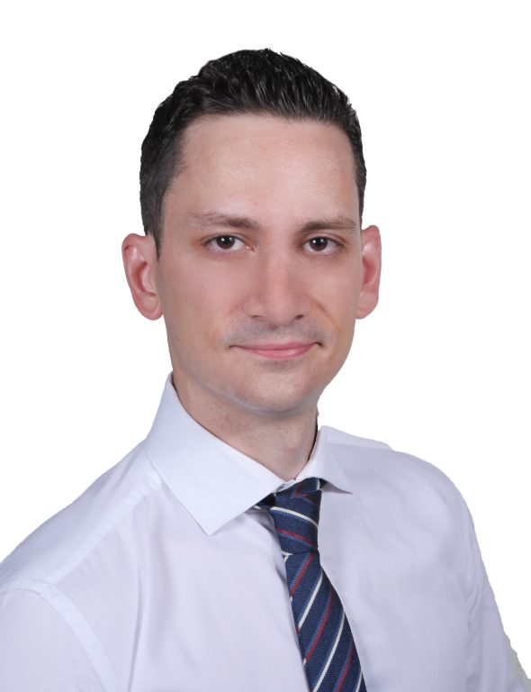 Sarantis Papadopoulos in front of white background