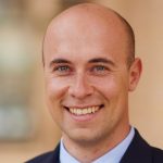 Karl Overdick Profile Pic In Dark Suit And Tie