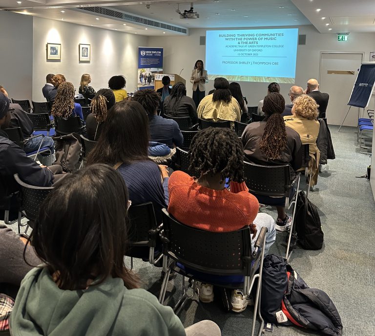 Shirley Thompson addressing a room full of attendees