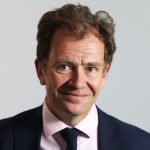 Nick Broughton Profile Pic In Light Shirt And Dark Jacket And Tie