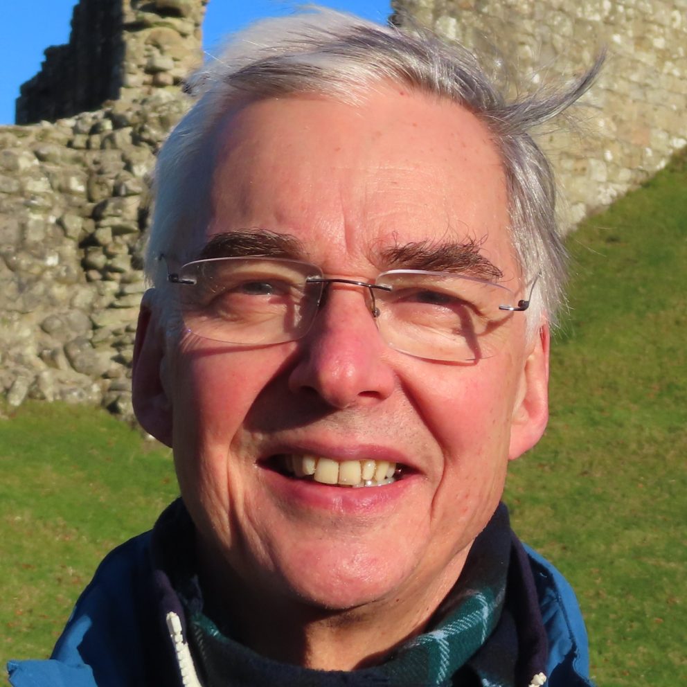 John Ashton Profile Pic outside with apparent ruins behind