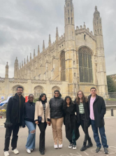 Students By Kings College Chapel In Cambridge