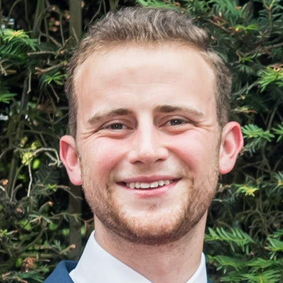 David Sher Profile Pic With Hedge Behind