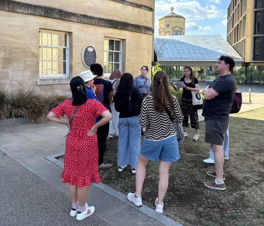 Students gather outside the Radcliffe Humanities building