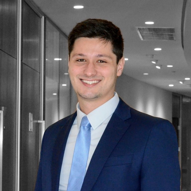 Fernando Mauad wearing suit with blue tie