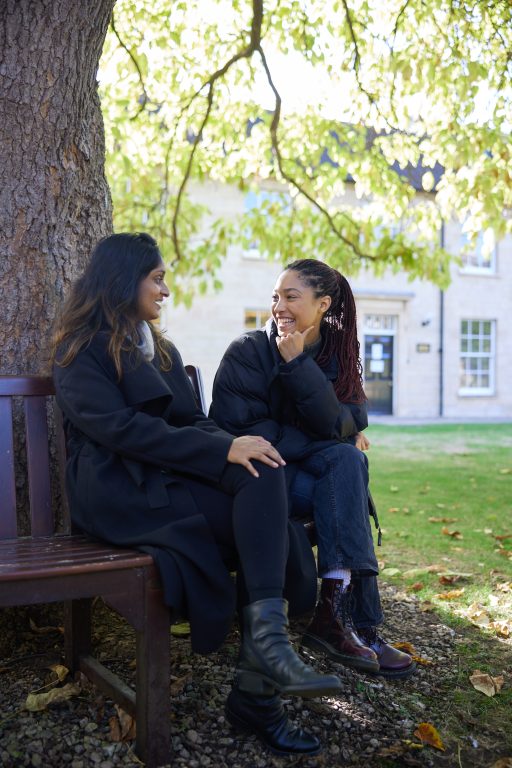 University Of Oxford Students talking under a tree By Ian Wallman