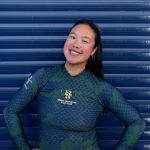 Michelle Yeung wearing GTBC rowing top