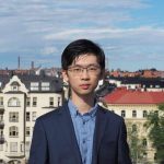 Keyu Zang in front of skyline