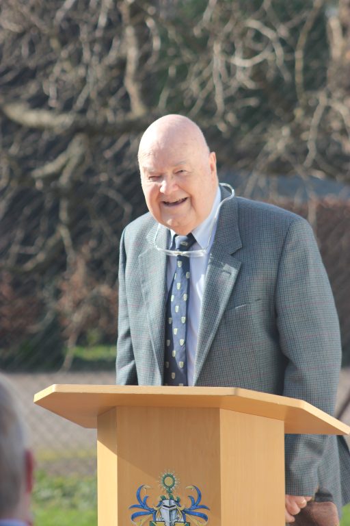John Lennox behind lectern