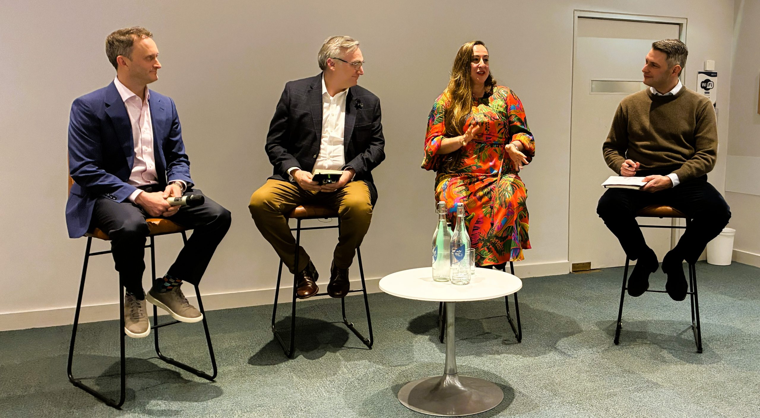 Benny Axt, Matthew Frohn, Susanna Kislenko and Christiaan de Koning, seated on stage
