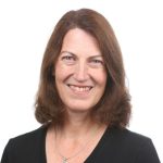 Beth Breeze Profile Pic In Dark Top With Light Background