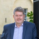 Sir Michael Dixon updated headshot May 2026