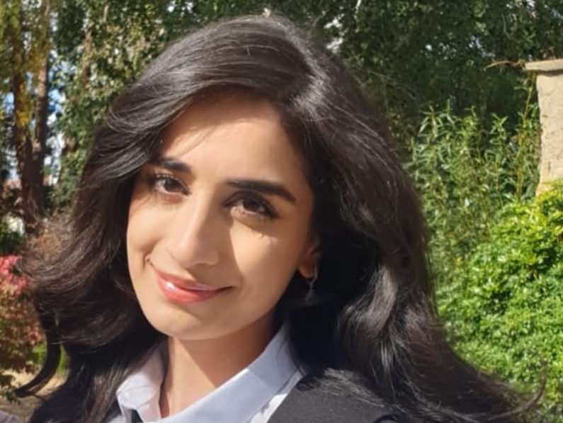 Amira Bhaiji Landscape Profile Pic In Graduation Dress