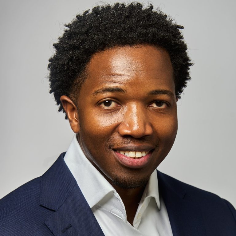 Farai Masendeke Profile Pic In Light Shirt And Dark Blue Jacket.