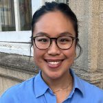Michelle Yeung Profile Pic smiling wearing glasses