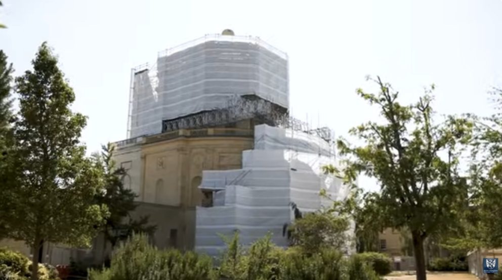 Behind The Scaffolding